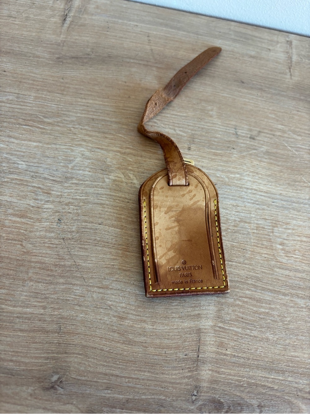Authentic Louis Vuitton id tag